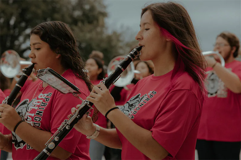 The Springdale High School band and spirit squad welcomed attendees at the 2024 Welcoming Week Launch event.