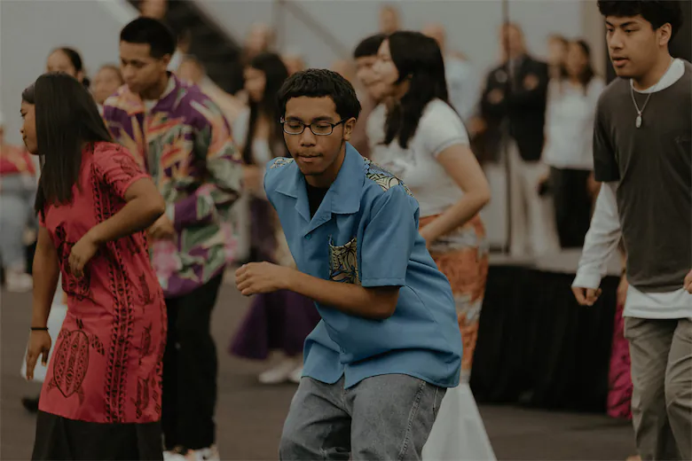 Marshallese student dancers perform during the Welcoming Week 2024 Launch at Springdale High School
